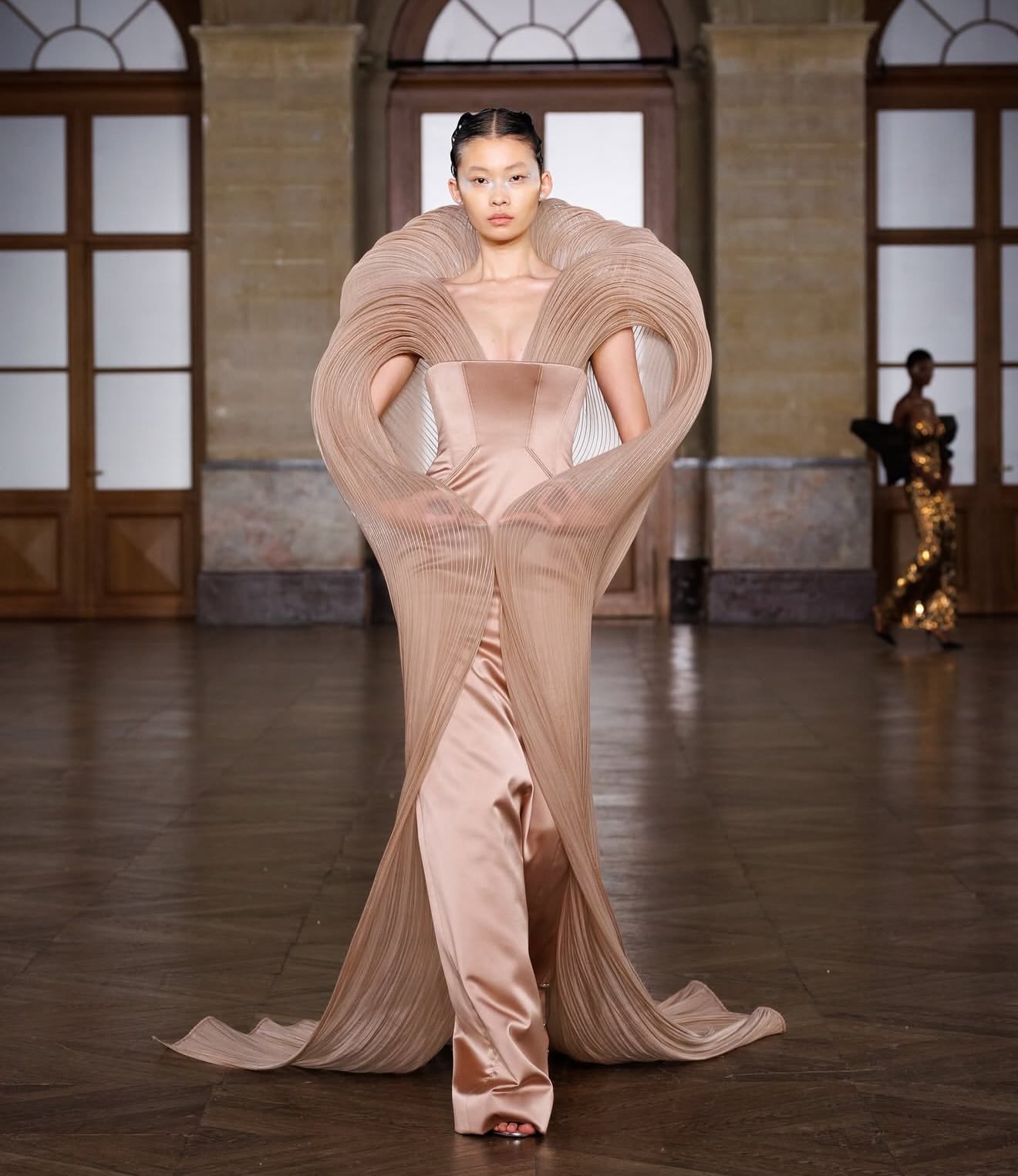 Blush evening gown with intricate embellished details